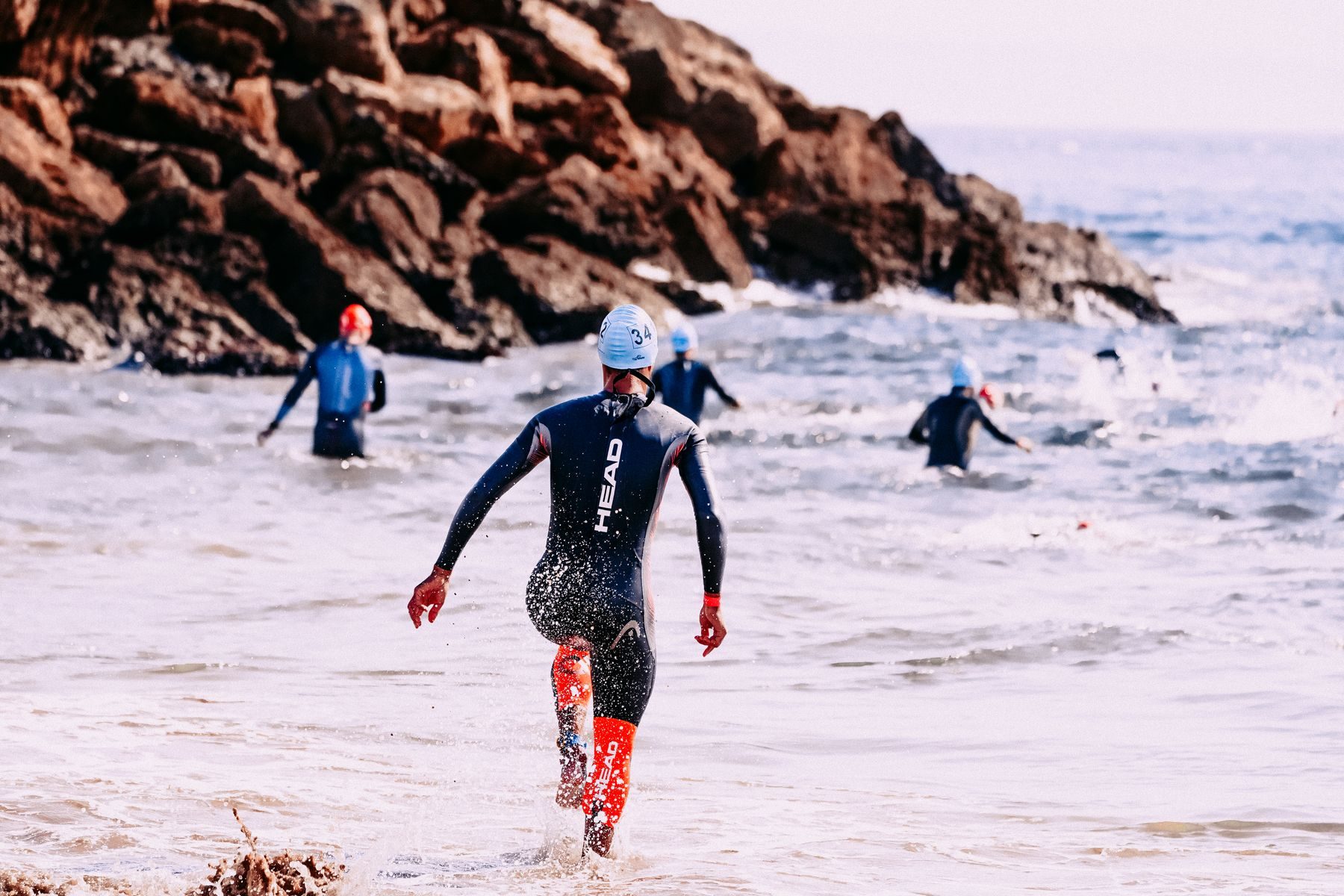 Léo Ferrand coming out of the water during a triathlon race